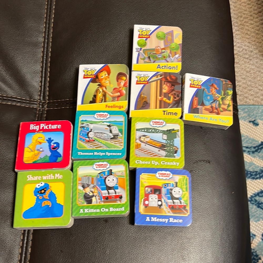 4 Disney toy story Hard cover books. 4 Thomas Story, and 2 Sesame street books.